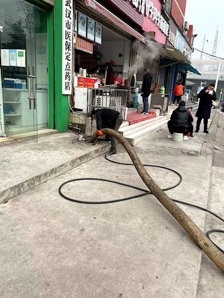 下水道常堵 众商家挠头 汉阳一社区协调出按面积包年解决方案